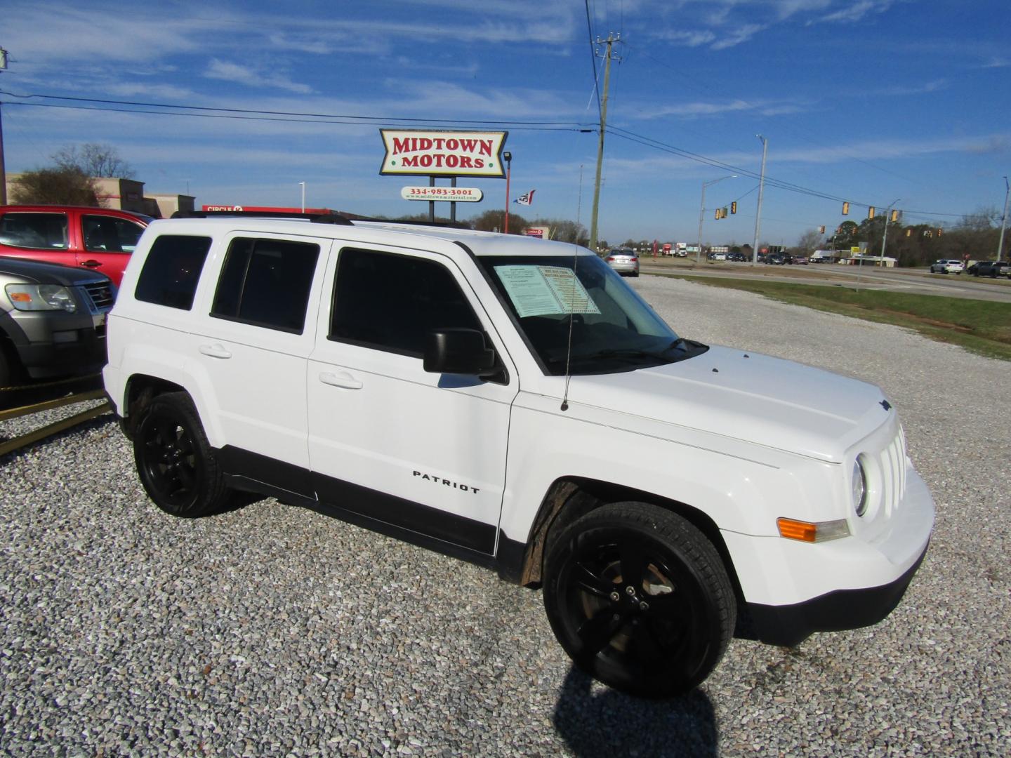 2015 White /Gray Jeep Patriot Sport 2WD (1C4NJPBA2FD) with an 2.0L L4 DOHC 16V engine, Automatic transmission, located at 15016 S Hwy 231, Midland City, AL, 36350, (334) 983-3001, 31.306210, -85.495277 - Photo#0